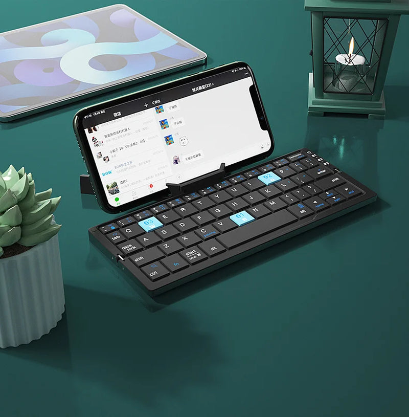 Compact and Versatile Jomaa Foldable Bluetooth Keyboard - Rechargeable Mini Wireless Keypad with Stand for Ultimate Mobility